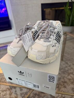 adidas White and Cream Women's Sneakers with Black Stripes